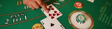 Antarmuka JILI dengan meja live dealer dan slot di platform obcbet